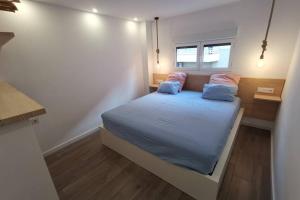 Postel nebo postele na pokoji v ubytování Moraira Dream - RENOVATED - Moraria City Center