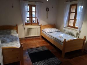 Postel nebo postele na pokoji v ubytování Penzion 166 - Herlíkovice