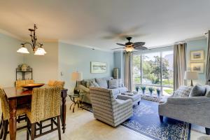 a living room with a couch and a table at 2212 Villamare 2 BR Palmetto Dunes Condo in Hilton Head Island