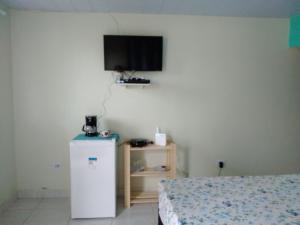 TV a/nebo společenská místnost v ubytování Casa Noronha Tropical