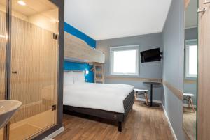 Postel nebo postele na pokoji v ubytování ibis budget Lima Miraflores