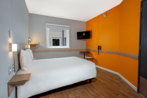 Postel nebo postele na pokoji v ubytování ibis budget Lima Miraflores