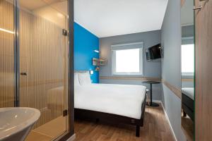 Postel nebo postele na pokoji v ubytování ibis budget Lima Miraflores