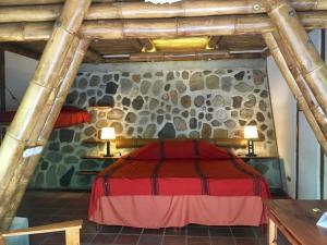 Postel nebo postele na pokoji v ubytování Reserva Natural Atitlan