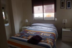 A bed or beds in a room at Nice Flat -200m Center-2 Baths- 3 Bedrooms 5pers