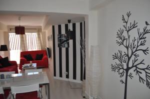 A seating area at Nice Flat -200m Center-2 Baths- 3 Bedrooms 5pers