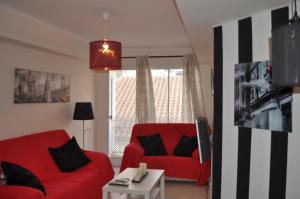 A seating area at Nice Flat -200m Center-2 Baths- 3 Bedrooms 5pers