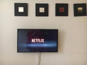 A television and/or entertainment centre at Nice Flat -200m Center-2 Baths- 3 Bedrooms 5pers