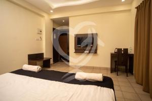 De Alcazar Calangute客房内的一张或多张床位