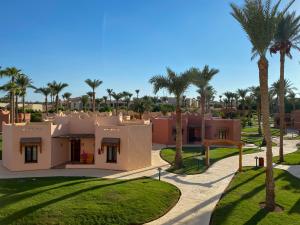 a view of a resort with palm trees at Nubian Village, Families and Couples only in Sharm El Sheikh