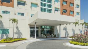 a rendering of the front of a building at Holiday Inn Express Manzanillo, an IHG Hotel in Manzanillo