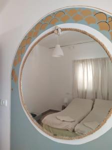 Giường trong phòng chung tại Juha's Guesthouse - Zarqa Bay