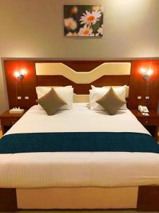 Кровать или кровати в номере Hawaii Paradise Aqua Park Resort - Families and Couples Only