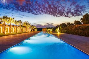 The swimming pool at or close to Il San Corrado di Noto