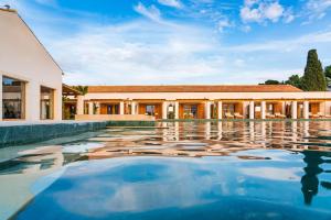 The swimming pool at or close to Il San Corrado di Noto