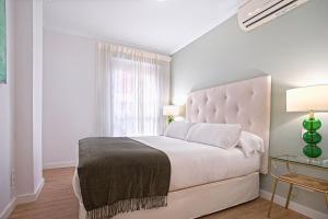 Posteľ alebo postele v izbe v ubytovaní Genteel Home San Pablo