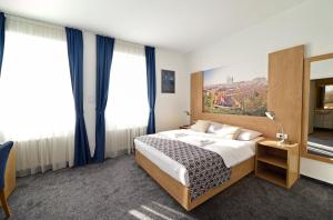 En eller flere senger på et rom på Hotel Orient Zagreb
