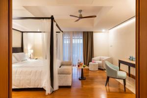 A bed or beds in a room at Il San Corrado di Noto