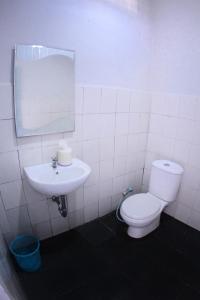 Koupelna v ubytování Hotel FX72 Ruteng