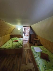 En eller flere senge i et værelse på Casa Verde