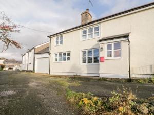 an image of a house with a garage at Pennant in Denbigh