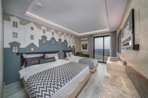 Postel nebo postele na pokoji v ubytování ARIA RESORT & SPA HOTEL Ultra All Inclusive