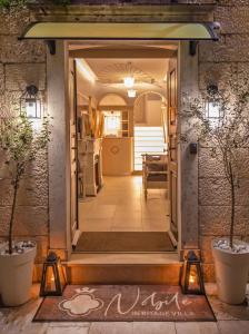 a hallway leading into a house with a doorway at Heritage Villa Nobile in Dubrovnik