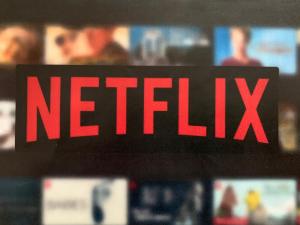 a sign with the word netflix on a shelf at ORBIT TATRY Apartments, Starý Smokovec, Vysoké Tatry in Starý Smokovec