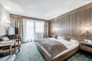 Postel nebo postele na pokoji v ubytování Hotel Sportiv by VAYA