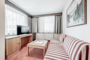 TV a/nebo společenská místnost v ubytování Hotel Sportiv by VAYA