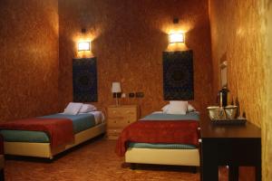Tempat tidur dalam kamar di Acquavilla