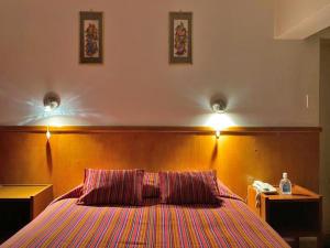 Rúm í herbergi á Saphi Inn Cusco - Excelente ubicación