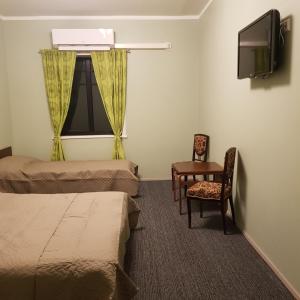 Giường trong phòng chung tại Goodwin Guest House