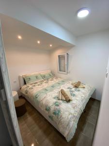 Postel nebo postele na pokoji v ubytování Apartman "Majka"