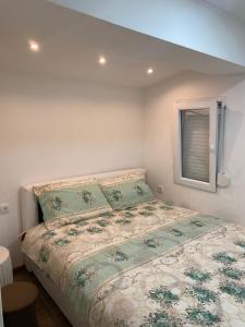 Postel nebo postele na pokoji v ubytování Apartman "Majka"