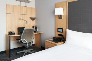 Postel nebo postele na pokoji v ubytování World Center Hotel