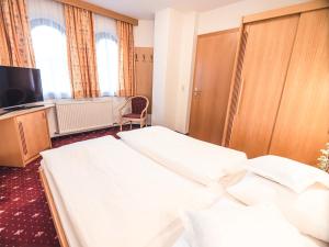 Postel nebo postele na pokoji v ubytování Hotel Andrea 3-Sterne Superior