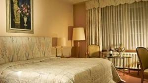 Postel nebo postele na pokoji v ubytování Hotel Krone