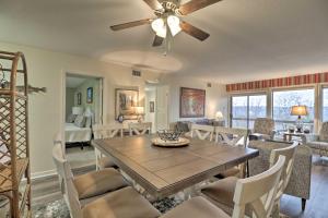 a dining room with a table and chairs at 4 Mi to Lake Unit with Pool Access in Fairfield Bay in Fairfield Bay