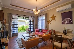 A seating area at Kinga Homes Boutique Hotel