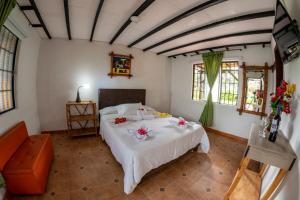 Hotel Alto de los Andaquies客房内的一张或多张床位