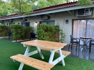 A patio or other outdoor area at Ashdot Yaacov Ichud Kibbutz Country Lodging