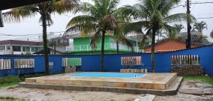 A piscina localizada em Casa Aconchego com PISCINA ou nos arredores