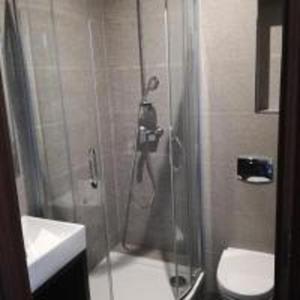 Łazienka w obiekcie Aparthotel Łódź 55 Piotrkowska
