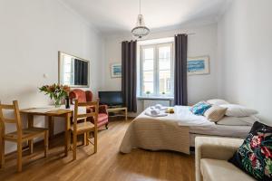 Posedenie v ubytovaní P&O Apartments Old Town