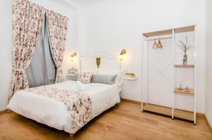 Postel nebo postele na pokoji v ubytování PALACIO Boutique