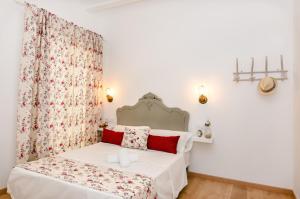 Postel nebo postele na pokoji v ubytování PALACIO Boutique