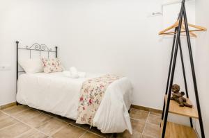 Postel nebo postele na pokoji v ubytování PALACIO Boutique