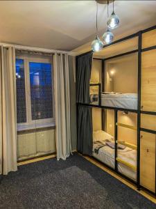 Postel nebo postele na pokoji v ubytování Ehostel360