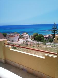 a view of the ocean from a balcony at Villa Fiorella in Sciacca